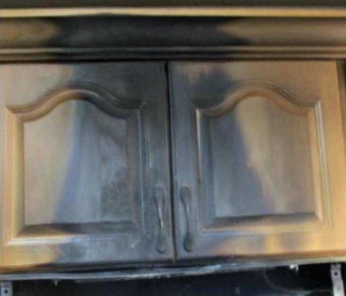 Kitchen cabinet damaged by fire